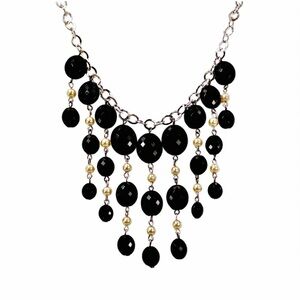 Black and white fringe bead necklace with black oval and white round beads New